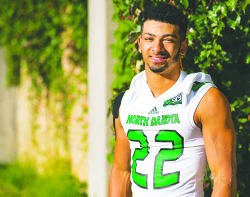 John Santiago, sophomore running back for the UND football team, pauses during football practice on Tuesday, September 13, 2016. Photo by Nick Nelson/ The Dakota Student.