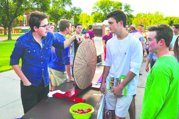 Geography club president Elijah Sack speaks to students during the Student Involvement Expo on Saturday, August 20, 2016.