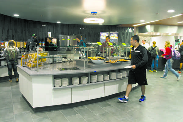 Students browse the breakfast options at the official opening of Wilkerson Commons on September 23, 2015. Photo by Nick Nelson/ The Dakota Student