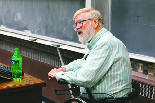 Michael Gaffey, a UND professor Space Studies, speaks during an astronomy event Monday evening at Witmer Hall.