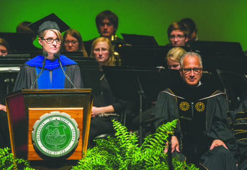 Rebecca Weaver-Hightower, a professor in English at UND, presides over the inauguration of President Mark Kennedy on Monday, October 10, 2016 at the Chester Fritz Auditorium.