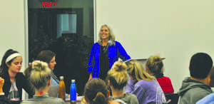 Robyn Ochs, a bisexual activist and writer, speaks to UND students during an event at Wilkerson Commons last Wednesday as part of National Coming Out Week.