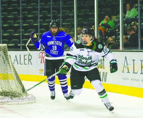 Vilma Tanskanen chases the puck during Saturdays game against Minnesota State Mankato at the Ralph Engelstad Arena.