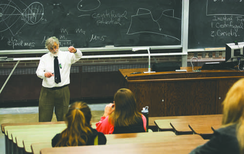 Dr. William Schwalm, professor in physics and astrophysics, addresses students at Witmer Hall in November 2014.