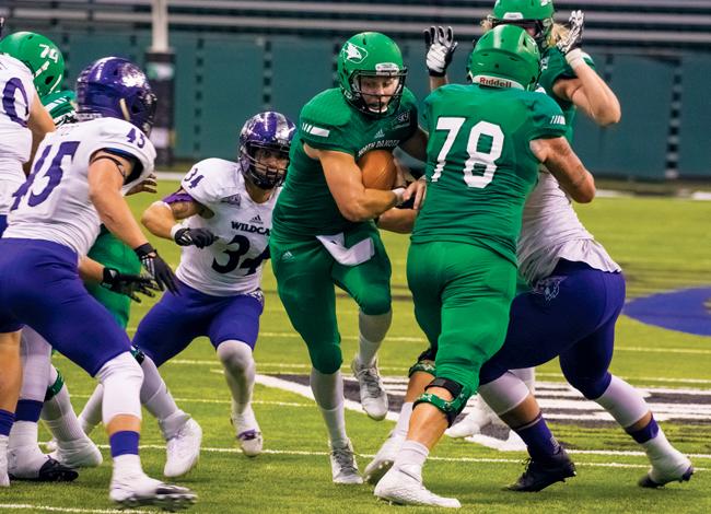 Senior quarterback Ryan Bartels finds an opening in the Weber State defense Oct. 29 at the Alerus Center.