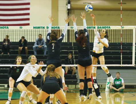 Tamara Merseli (right) spikes the ball against Idaho at the Betty Engelstad Center on Nov. 5.