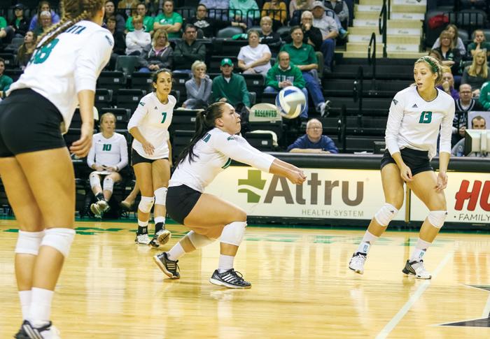 Tamika Brekke (center) bumps the ball during a match aginst Idaho at the Betty Engelstad Sioux Center on Nov. 5. The Fighting Hawks take on Minnesota today in the first round of the NCAA volleyball tournament in Minneapolis, Minn.