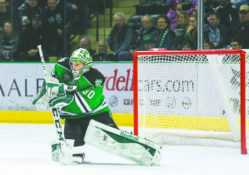 UND goalie Matt Hrynkiw blocks a shot against Colorado College last season. Nick Nelson/ Dakota Student