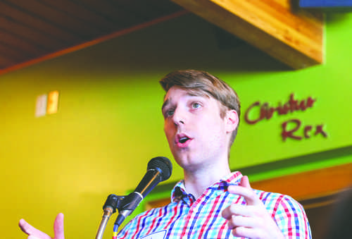 Kyle Thorson, owner of Archives Coffee Shop, speaks during the raise your cups event Saturday morning on-campus. Daniel Yun/ Dakota Student