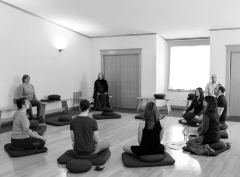 Students and faculty meditate in the Lotus Meditation Center on Saturday, January 28, 2017 as part of Interfaith week proceedings.