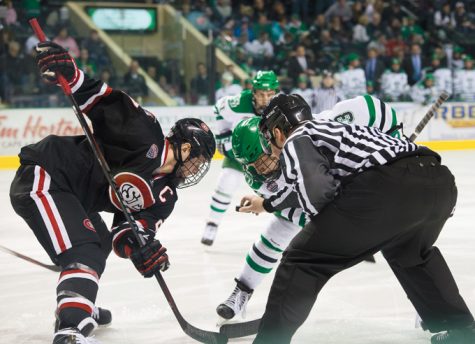 Defender Tucker Poolman faces off against St. Cloud State last season at the Ralph Engelstad Arena.