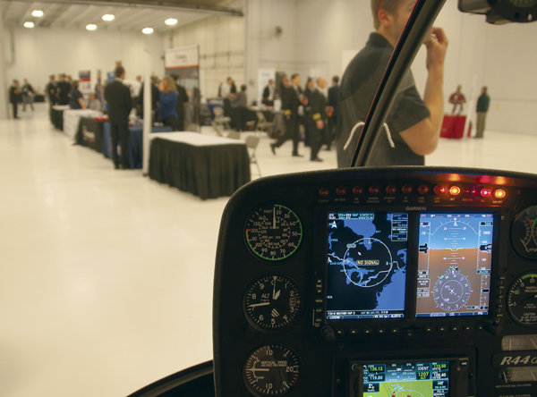 The cockpit of a Robinson R-44 helicopter was one of many simulations on display for a Student Aviation Management Association (SAMA) event Saturday, April 22, 2017 at the Grand Forks Air Force Base.