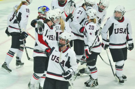 The 2010 U.S. Womens Hockey team celebrating a win