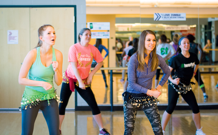 Liana and Laura Haven dance during a XaBeat class at the Wellness Center.