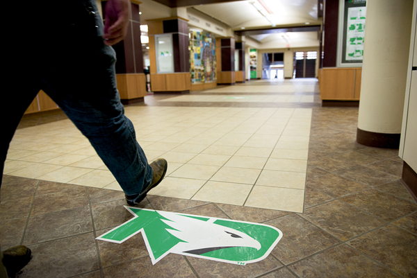 A UND student walks across the main level of the Memorial Union on March 27, 2017. DS File Photo