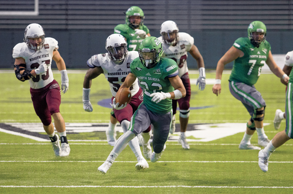 John Santiago breaks away to score a touchdown in the second quarter of Saturdays Potato Bowl game against Missouri State.