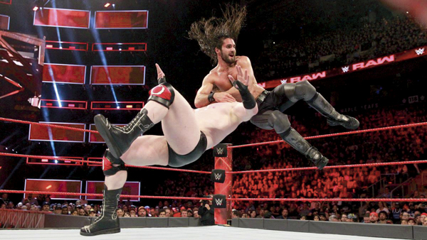 WWE superstar Seth Rollins slams Shaemus in a prior match.