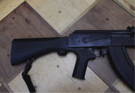 An AK-47 is equipped with a bump stock produced by Slide Fire Solutions. 