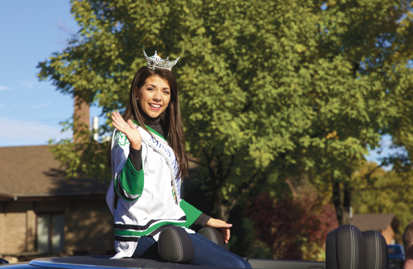 Miss North Dakota, Lizzie Jensen, waves to onlookers of the 2017 Homecoming parade Saturday morning in Grand Forks.