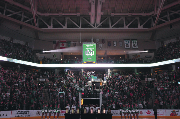 The 2016 NCAA championship banner is raised at the Ralph Engelstad Arena on September 30, 2016.