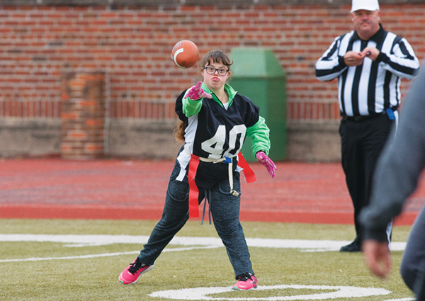 Bailey Bjorge makes a long pass for a touchdown during Saturday's Special Olympics flag football tournament at Memorial Stadium.