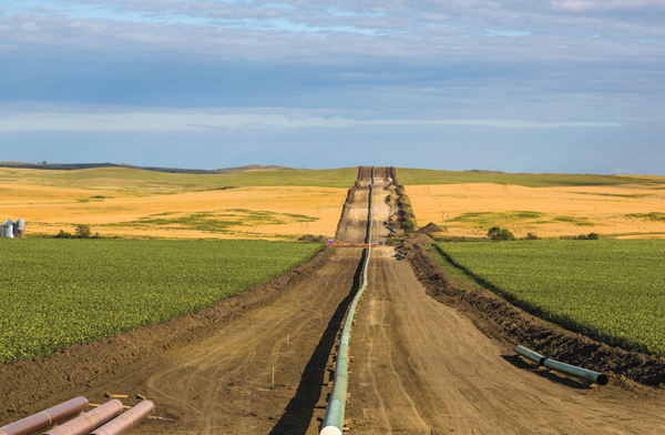 A pipeline installation between farms, as seen from 50th Avenue in New Salem, North Dakota on August 25, 2016. 