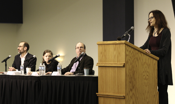 UND Writers Conference director Crystal Alberts introduces Art and Justice panel members (from left) UND law professor Steven R. Morrison, writer Molly McCully Brown, writer David Grann and artist Nicholas Galanin on Wednesday, March 21, 2018 in the Memorial Union Ballroom. 