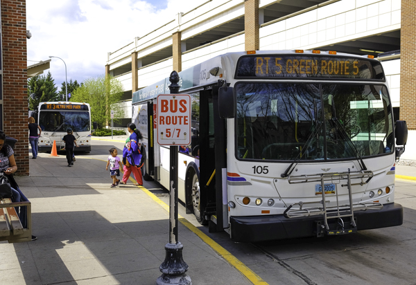 Commuters step off a Cities Area Transit (CAT) bus in downtown Grand Forks on May 3, 2017. Dakota Student FIle Photo