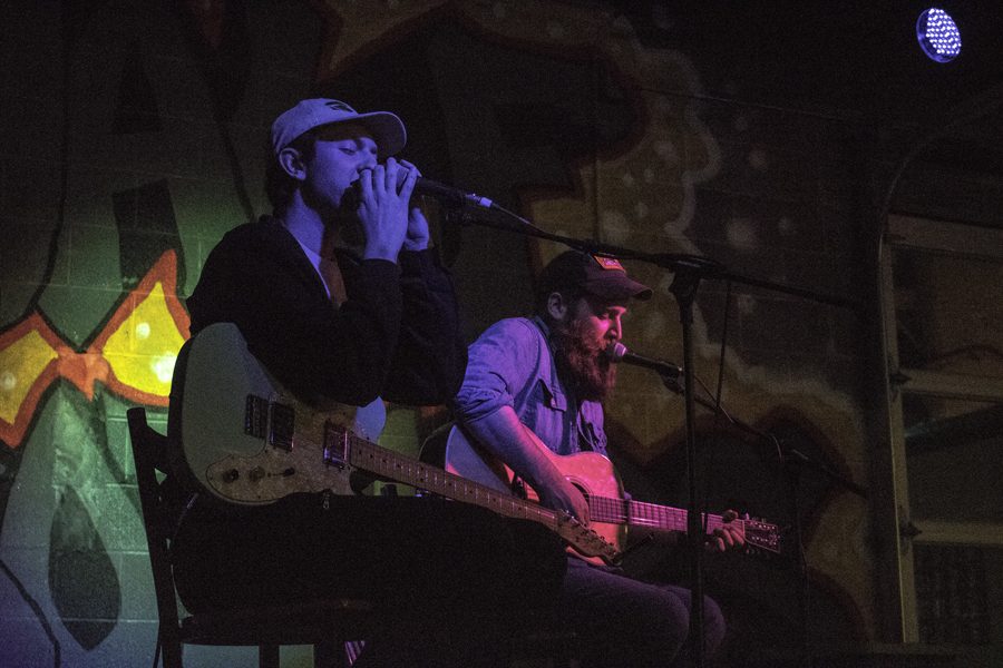 Minneapolis musician Joe Kopel (left) and David Allen, from Hatton, N.D., took the stage Friday night at Half Brothers Brewing Company in downtown Grand Forks. 
