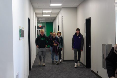Students walking in new Mcvey Dorm on UND campus