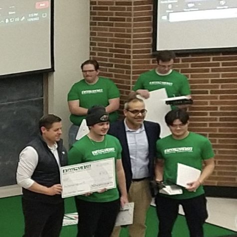 Student accepts award at the University of North Dakota