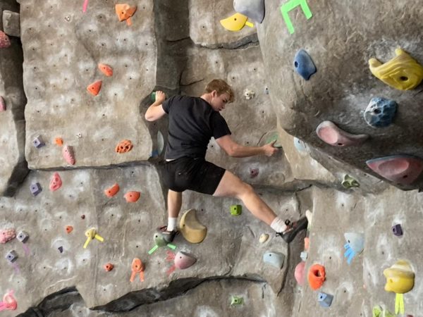 “King of the Wall” Competition Draws New Climbers to Wellness Center