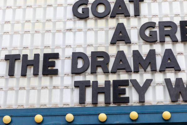 The marquee lists "The Drama."