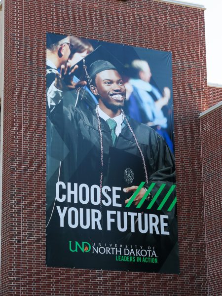 A UND "Choose Your Future" poster.